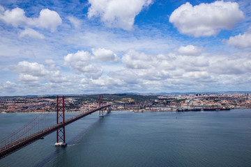 Fototapeta premium Panoramic view of Ponte 25 de Abril, long bridge in Lisbon