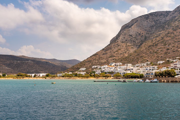 Coast of Sifnos island. The Kamares village surrounded by beautiful mountains. Greece