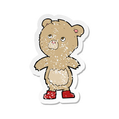 Obraz na płótnie Canvas retro distressed sticker of a cartoon teddy bear