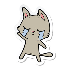 sticker of a crying cartoon cat