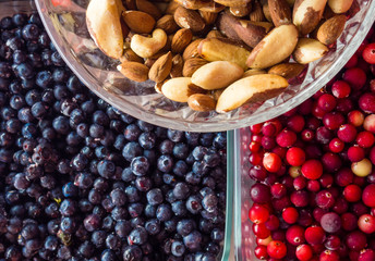 Healthy food clean eating selection: superfood, nuts, berries background, Foods for healthy Heart