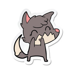 sticker of a happy cartoon fox