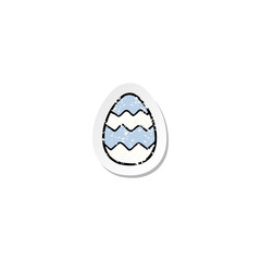 distressed sticker of a cartoon painted easter egg