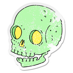 distressed sticker of a quirky hand drawn cartoon skull