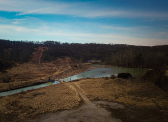 Bridge that leads over the creek and up the hill