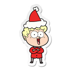 sticker cartoon of a happy man wearing santa hat