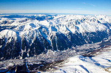 Chamonix Mont Blanc - best destination for winter holiday full of skiing, snowboarding and relaxing. The top view of this town with peaks of french Alps.