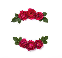 Naklejka premium Floral frame wreath made of pink rose flowers and leaves isolated on white background. Flat lay. Top view.