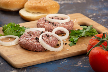 Raw minced beef burgers