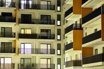 Exterior of apartment building at night 