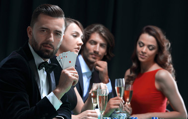 Handsome man playing in casino