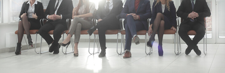 close up. group of business people sitting in lobby of office