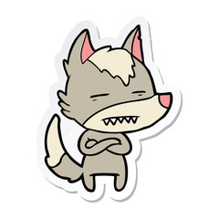 sticker of a cartoon wolf showing teeth