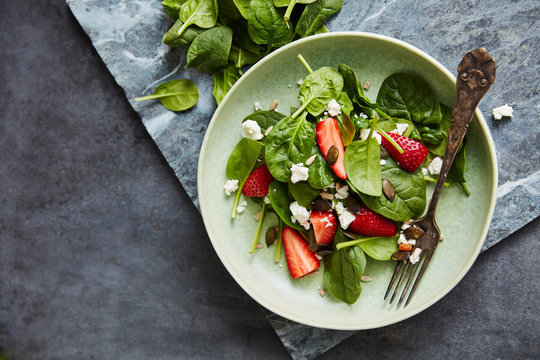 Salad With Spinach, Strawberry, Feta And Pumpkin Seeds