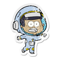 distressed sticker of a cartoon surprised astronaut
