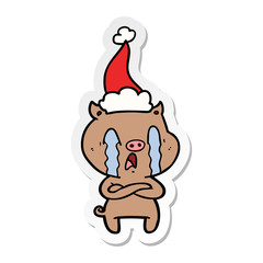 crying pig sticker cartoon of a wearing santa hat