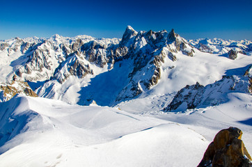 Amazing view of french Alps with the summits covered with snow. Winter holiday in...