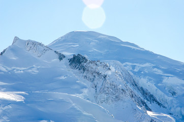 Touch the amazing Mont Blanc summit and the glaciers around with your fingers. The closest view of the highest european mountain in french region Chamonix-Mont-Blanc during winter time. 