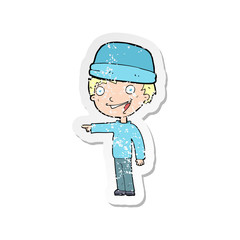 retro distressed sticker of a cartoon man wearing winter hat