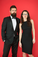 Formal dress code. Official event concept. Man bearded wear tuxedo girl elegant dress. Visiting event or ceremony. Couple classy clothes. Elite event. Main rules picking clothes. Corporate party