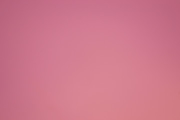 It is a monophonic background of pink color.