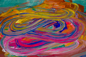 It is abstraction from all colors of the rainbow and a view of wavy and twisting lines.