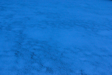 It is not monophonic dark blue background. Snow on the earth.