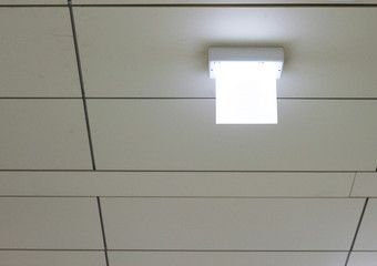 Blank light sign on the ceiling
