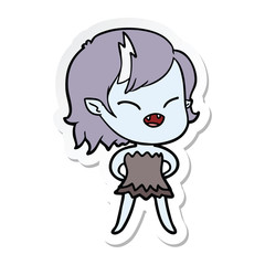 sticker of a cartoon laughing vampire girl