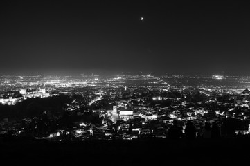 Panorama of Sierra Nevada and Granada, Spain as Seen from Sacromonte Hill at Night - obrazy, fototapety, plakaty