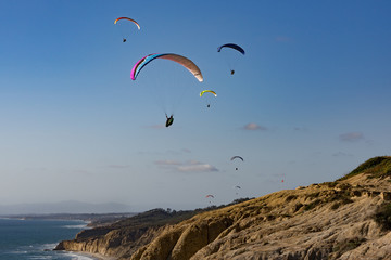 Fototapeta na wymiar paragliders in the sky
