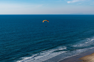 paraglider over the ocean