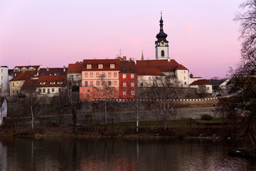 Evening winter royal medieval Town Pisek with the Castle above the river Otava, Czech Republic 