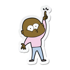sticker of a cartoon bald man staring