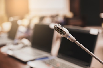 Microphone over the blurred business forum Meeting or Conference Training Learning Coaching Room...