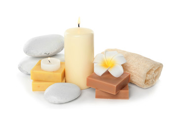 Fototapeta na wymiar Beautiful spa composition with candles and soap on white background