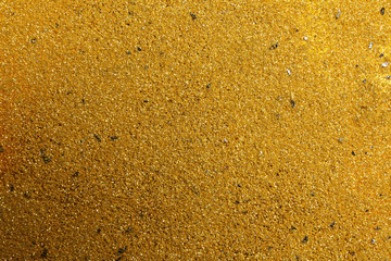 Shiny golden sand as background, top view