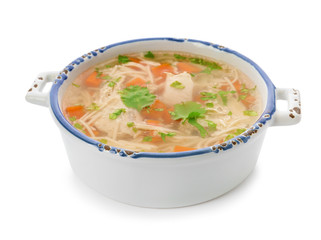 Dish with fresh homemade chicken soup on white background