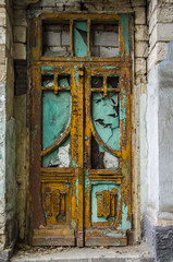 Old wooden door with cracked paint