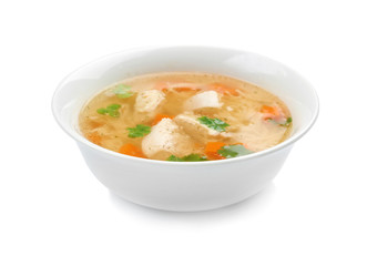 Dish with fresh homemade chicken soup on white background