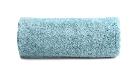 Rolled soft terry towel on white background