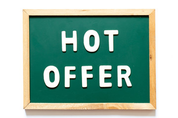 Green blackboard and wood frame with word hot offer on white background
