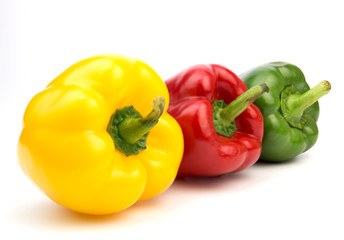 Yellow, red, green, fresh bell pepper isolated on white background 
