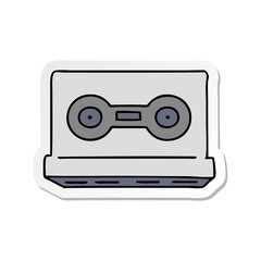 sticker cartoon doodle of a sticker cassette tape