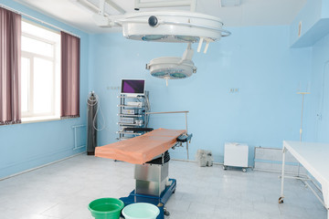 Operating table. Cabinet for operations. Hospital room Surgical table.