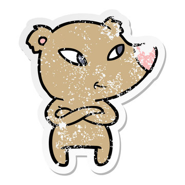 distressed sticker of a cute cartoon bear with crossed arms