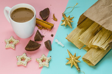 Colorful composition with sweet tamales, hot chocolate, cinnamon, star cookies and the traditional Mexican baby Jesus from Candelaria Day. Pop art design.