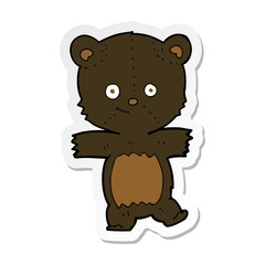 sticker of a cartoon cute black bear