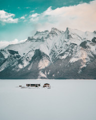 Scenic Lake Minnewanka in Banff National Park during the winter (Alberta, Canada)
