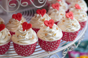 cupcakes with pink frosting in wedding party